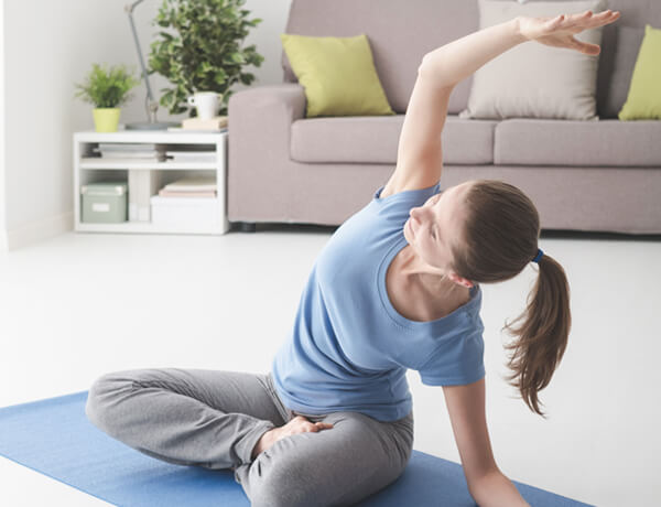 woman practicing yoga at home vxzrf8d.jpg